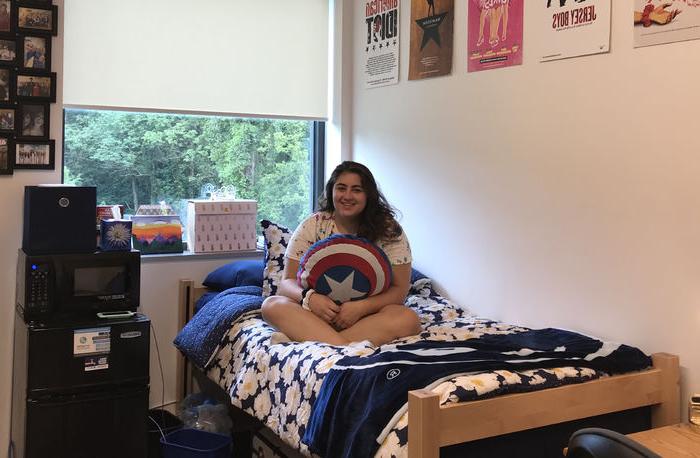 Nicole DiMauro in her room in Brandywine's Orchard Hall.
